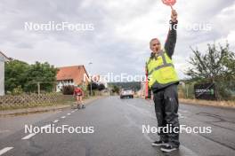 08.07.2023, Romont, Switzerland (SUI): Stop sign men Event Feature: - Dupaski Festival, Romont (SUI). www.nordicfocus.com. © Manzoni/NordicFocus. Every downloaded picture is fee-liable.