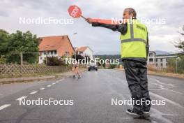 08.07.2023, Romont, Switzerland (SUI): Stop sign men Event Feature: - Dupaski Festival, Romont (SUI). www.nordicfocus.com. © Manzoni/NordicFocus. Every downloaded picture is fee-liable.