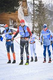 21.01.2023, Zuoz Switzerland (SUI): Stian Hoelgaard (NOR), Joar Thele (NOR), Gian Flurin Pfaeffli (SUI), (l-r) - Ski Classics La Diagonela, Zuoz (SUI). www.nordicfocus.com. © Reichert/NordicFocus. Every downloaded picture is fee-liable.