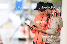 03.08.2024, Sandnes, Norway (NOR): Sverre Olsbu Roeiseland (NOR), coach Team Germany, Simon Fourcade (FRA), (l-r) - BLINK24 Festival Biathlon - Sandnes (NOR). www.nordicfocus.com. © Manzoni/NordicFocus. Every downloaded picture is fee-liable.