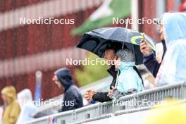 03.08.2024, Sandnes, Norway (NOR): Fans with umbrella under the rain Event Feature: - BLINK24 Festival Biathlon - Sandnes (NOR). www.nordicfocus.com. © Manzoni/NordicFocus. Every downloaded picture is fee-liable.