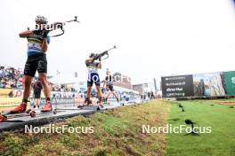 03.08.2024, Sandnes, Norway (NOR): Emilien Jacquelin (FRA), Petter Austberg Bjoern (NOR), (l-r) - BLINK24 Festival Biathlon - Sandnes (NOR). www.nordicfocus.com. © Manzoni/NordicFocus. Every downloaded picture is fee-liable.