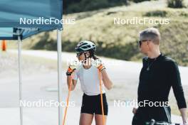 19.05.2024, Forni Avoltri, Italy (ITA): Lisa Vittozzi (ITA), Jonne Kahkonen (FIN), coach Team Italy, (l-r) - Biathlon summer training, Forni Avoltri (ITA). www.nordicfocus.com. © Del Fabbro/NordicFocus. Every downloaded picture is fee-liable.