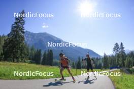 06.08.2024, Lenzerheide, Switzerland (SUI): Elisa Gasparin (SUI), Jeremy Finello (SUI), (l-r) - Biathlon summer training, Lenzerheide (SUI). www.nordicfocus.com. © Manzoni/NordicFocus. Every downloaded picture is fee-liable.