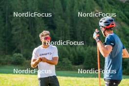 29.08.2024, Bessans, France (FRA): Simon Fourcade (FRA), Coach Team France, Quentin Fillon-Maillet (FRA), (l-r) - Biathlon summer training, Bessans (FRA). www.nordicfocus.com. © Authamayou/NordicFocus. Every downloaded picture is fee-liable.