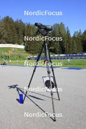 20.05.2024, Lenzerheide, Switzerland (SUI): Event Feature: Coaches glass with a target board and a drink bottle at the shooting range - Biathlon summer training, Lenzerheide (SUI). www.nordicfocus.com. © Manzoni/NordicFocus. Every downloaded picture is fee-liable.