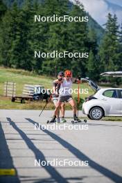 28.08.2024, Bessans, France (FRA): Cyril Burdet (FRA), Coach Team France, Justine Braisaz-Bouchet (FRA), (l-r) - Biathlon summer training, Bessans (FRA). www.nordicfocus.com. © Authamayou/NordicFocus. Every downloaded picture is fee-liable.