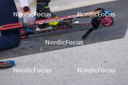 11.10.2024, Ramsau am Dachstein, Austria (AUT): Zuzana Remenova (SVK) grabs the Swix poles - Biathlon summer training, Dachsteinglacier, Ramsau am Dachstein (AUT). www.nordicfocus.com. © Manzoni/NordicFocus. Every downloaded picture is fee-liable.