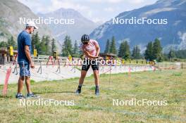 28.08.2024, Bessans, France (FRA): Jean-Paul Giachino (FRA), Coach Team France, Julia Simon (FRA), (l-r) - Biathlon summer training, Bessans (FRA). www.nordicfocus.com. © Authamayou/NordicFocus. Every downloaded picture is fee-liable.