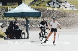 19.05.2024, Forni Avoltri, Italy (ITA): Lisa Vittozzi (ITA), Jonne Kahkonen (FIN), coach Team Italy, (l-r) - Biathlon summer training, Forni Avoltri (ITA). www.nordicfocus.com. © Del Fabbro/NordicFocus. Every downloaded picture is fee-liable.