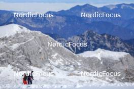 12.10.2024, Ramsau am Dachstein, Austria (AUT): Oceane Michelon (FRA), Cyril Burdet (FRA), coach Team France, (l-r) - Biathlon summer training, Dachsteinglacier, Ramsau am Dachstein (AUT). www.nordicfocus.com. © Manzoni/NordicFocus. Every downloaded picture is fee-liable.