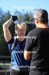 06.08.2024, Lenzerheide, Switzerland (SUI): Gion Stalder (SUI), Andreas Kuppelwieser (ITA), coach Team Switzerland, (l-r) - Biathlon summer training, Lenzerheide (SUI). www.nordicfocus.com. © Manzoni/NordicFocus. Every downloaded picture is fee-liable.