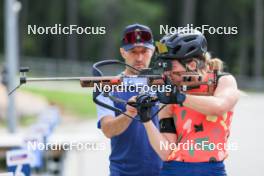 15.07.2024, Lenzerheide, Switzerland (SUI): Armin Auchentaller (ITA), Coach Team USA, Grace Castonguay (USA), (l-r) - Biathlon summer training, Lenzerheide (SUI). www.nordicfocus.com. © Manzoni/NordicFocus. Every downloaded picture is fee-liable.