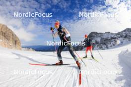 14.10.2024, Ramsau am Dachstein, Austria (AUT): Elisa Gasparin (SUI), Sandra Flunger (AUT) coach Team Switzerland, (l-r) - Biathlon summer training, Dachsteinglacier, Ramsau am Dachstein (AUT). www.nordicfocus.com. © Manzoni/NordicFocus. Every downloaded picture is fee-liable.