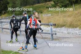 16.09.2024, Lenzerheide, Switzerland (SUI): Niklas Hartweg (SUI), Sebastian Stalder (SUI), Sandro Bovisi (SUI), (l-r) - Biathlon summer training, Lenzerheide (SUI). www.nordicfocus.com. © Manzoni/NordicFocus. Every downloaded picture is fee-liable.