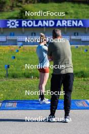 20.05.2024, Lenzerheide, Switzerland (SUI): Elisa Gasparin (SUI), Andreas Kuppelwieser (ITA), coach Team Switzerland, (l-r) - Biathlon summer training, Lenzerheide (SUI). www.nordicfocus.com. © Manzoni/NordicFocus. Every downloaded picture is fee-liable.