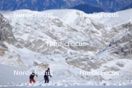 12.10.2024, Ramsau am Dachstein, Austria (AUT): Oceane Michelon (FRA), Cyril Burdet (FRA), coach Team France, (l-r) - Biathlon summer training, Dachsteinglacier, Ramsau am Dachstein (AUT). www.nordicfocus.com. © Manzoni/NordicFocus. Every downloaded picture is fee-liable.