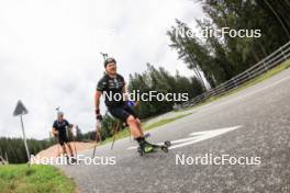 04.09.2024, Lenzerheide, Switzerland (SUI): Endre Stroemsheim (NOR), Johannes Dale-Skjevdal (NOR), (l-r) - Biathlon summer training, Lenzerheide (SUI). www.nordicfocus.com. © Manzoni/NordicFocus. Every downloaded picture is fee-liable.