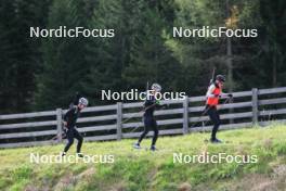 16.09.2024, Lenzerheide, Switzerland (SUI): Niklas Hartweg (SUI), Sebastian Stalder (SUI), Sandro Bovisi (SUI), (l-r) - Biathlon summer training, Lenzerheide (SUI). www.nordicfocus.com. © Manzoni/NordicFocus. Every downloaded picture is fee-liable.