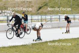 19.05.2024, Forni Avoltri, Italy (ITA): Jonne Kahkonen (FIN), coach Team Italy, Mirco Romanin (ITA), Michela Carrara (ITA), Lisa Vittozzi (ITA), (l-r) - Biathlon summer training, Forni Avoltri (ITA). www.nordicfocus.com. © Del Fabbro/NordicFocus. Every downloaded picture is fee-liable.