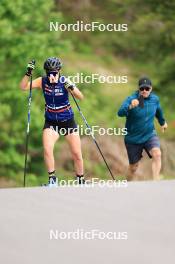 12.06.2024, Premanon, France (FRA): Gilonne Guigonnat (FRA), Lionel Laurent (FRA), media coordinator Team France, (l-r) - Biathlon summer training, Premanon (FRA). www.nordicfocus.com. © Manzoni/NordicFocus. Every downloaded picture is fee-liable.