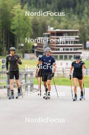 05.09.2024, Lenzerheide, Switzerland (SUI): Elisa Gasparin (SUI), Gion Stalder (SUI), Niklas Hartweg (SUI), Aita Gasparin (SUI), (l-r) - Biathlon summer training, Lenzerheide (SUI). www.nordicfocus.com. © Manzoni/NordicFocus. Every downloaded picture is fee-liable.