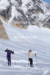 12.10.2024, Ramsau am Dachstein, Austria (AUT): Patrick Favre (ITA), coach Team France, Sophie Chauveau (FRA), (l-r) - Biathlon summer training, Dachsteinglacier, Ramsau am Dachstein (AUT). www.nordicfocus.com. © Manzoni/NordicFocus. Every downloaded picture is fee-liable.