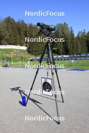 20.05.2024, Lenzerheide, Switzerland (SUI): Event Feature: Coaches glass with a target board and a drink bottle at the shooting range - Biathlon summer training, Lenzerheide (SUI). www.nordicfocus.com. © Manzoni/NordicFocus. Every downloaded picture is fee-liable.