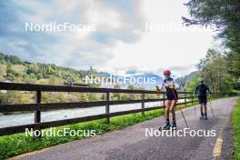 30.09.2024, Lavaze, Italy (ITA): Lisa Vittozzi (ITA), Mirco Romanin (ITA), coach Team Italy, (l-r) - Biathlon summer training, Lavaze (ITA). www.nordicfocus.com. © Barbieri/NordicFocus. Every downloaded picture is fee-liable.