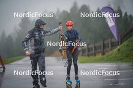 27.09.2024, Lavaze, Italy (ITA): Lisa Vittozzi (ITA), Jonne Kahkonen (FIN), coach Team Italy, (l-r) - Biathlon summer training, Lavaze (ITA). www.nordicfocus.com. © Barbieri/NordicFocus. Every downloaded picture is fee-liable.