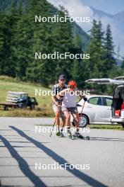 28.08.2024, Bessans, France (FRA): Cyril Burdet (FRA), Coach Team France, Justine Braisaz-Bouchet (FRA), (l-r) - Biathlon summer training, Bessans (FRA). www.nordicfocus.com. © Authamayou/NordicFocus. Every downloaded picture is fee-liable.