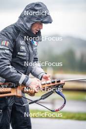 27.09.2024, Lavaze, Italy (ITA): Jonne Kahkonen (FIN), coach Team Italy - Biathlon summer training, Lavaze (ITA). www.nordicfocus.com. © Barbieri/NordicFocus. Every downloaded picture is fee-liable.