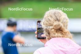 04.09.2024, Lenzerheide, Switzerland (SUI): Vetle Sjaastad Christiansen (NOR) covered through a mobile phone - Biathlon summer training, Lenzerheide (SUI). www.nordicfocus.com. © Manzoni/NordicFocus. Every downloaded picture is fee-liable.