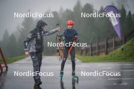 27.09.2024, Lavaze, Italy (ITA): Lisa Vittozzi (ITA), Jonne Kahkonen (FIN), coach Team Italy, (l-r) - Biathlon summer training, Lavaze (ITA). www.nordicfocus.com. © Barbieri/NordicFocus. Every downloaded picture is fee-liable.