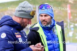 15.09.2024, Lenzerheide, Switzerland (SUI): Louis Deschamps (FRA), Oleksii Kravchenko (UKR), coach Team Ukraine, (l-r) - Sommer Nordic Event 2024, Sommer Biathlon Cup, Lenzerheide (SUI). www.nordicfocus.com. © Manzoni/NordicFocus. Every downloaded picture is fee-liable.