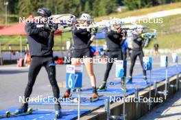 10.09.2024, Lenzerheide, Switzerland (SUI): Gion Stalder (SUI), Amy Baserga (SUI), Niklas Hartweg (SUI), Sebastian Stalder (SUI), (l-r) - Biathlon summer training, Lenzerheide (SUI). www.nordicfocus.com. © Manzoni/NordicFocus. Every downloaded picture is fee-liable.