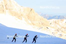 14.10.2024, Ramsau am Dachstein, Austria (AUT): Matthias Riebli (SUI), Lena Haecki-Gross (SUI), (l-r) - Biathlon summer training, Dachsteinglacier, Ramsau am Dachstein (AUT). www.nordicfocus.com. © Manzoni/NordicFocus. Every downloaded picture is fee-liable.