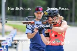 15.07.2024, Lenzerheide, Switzerland (SUI): Armin Auchentaller (ITA), Coach Team USA, Grace Castonguay (USA), (l-r) - Biathlon summer training, Lenzerheide (SUI). www.nordicfocus.com. © Manzoni/NordicFocus. Every downloaded picture is fee-liable.