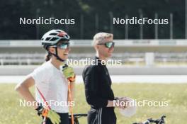 19.05.2024, Forni Avoltri, Italy (ITA): Lisa Vittozzi (ITA), Jonne Kahkonen (FIN), coach Team Italy, (l-r) - Biathlon summer training, Forni Avoltri (ITA). www.nordicfocus.com. © Del Fabbro/NordicFocus. Every downloaded picture is fee-liable.