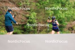 12.06.2024, Premanon, France (FRA): Lionel Laurent (FRA), media coordinator Team France, Gilonne Guigonnat (FRA), (l-r) - Biathlon summer training, Premanon (FRA). www.nordicfocus.com. © Manzoni/NordicFocus. Every downloaded picture is fee-liable.