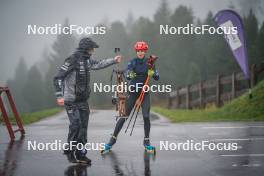 27.09.2024, Lavaze, Italy (ITA): Lisa Vittozzi (ITA), Jonne Kahkonen (FIN), coach Team Italy, (l-r) - Biathlon summer training, Lavaze (ITA). www.nordicfocus.com. © Barbieri/NordicFocus. Every downloaded picture is fee-liable.