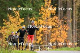 13.10.2024, Ramsau am Dachstein, Austria (AUT): Kein Einaste (EST), coach Team Switzerland, Sebastian Stalder (SUI), Joscha Burkhalter (SUI), Niklas Hartweg (SUI), (l-r) - Biathlon summer training, Ramsau am Dachstein (AUT). www.nordicfocus.com. © Manzoni/NordicFocus. Every downloaded picture is fee-liable.