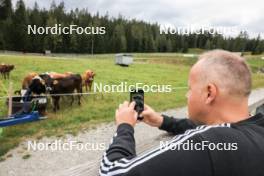 05.09.2024, Lenzerheide, Switzerland (SUI): Event Feature: Ukrainian doctor takes pictures of Cows - Biathlon summer training, Lenzerheide (SUI). www.nordicfocus.com. © Manzoni/NordicFocus. Every downloaded picture is fee-liable.