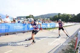 31.08.2024, Annecy, France (FRA): Fabien Claude (FRA), Sebastian Stalder (SUI), (l-r) - Martin Fourcade Nordic Festival Biathlon, Annecy (FRA). www.nordicfocus.com. © Manzoni/NordicFocus. Every downloaded picture is fee-liable.