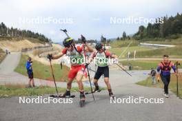 22.09.2024, Premanon, France (FRA): Benjamin De Grimaudet De Rochebouet (FRA), Flavio Guy (FRA), (l-r) - Biathlon Samse Summer Tour, pursuit, Premanon (FRA). www.nordicfocus.com. © Manzoni/NordicFocus. Every downloaded picture is fee-liable.