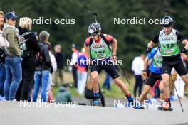 21.09.2024, Premanon, France (FRA): Tom Bouillet (FRA), Yannick Kreuzer (SUI), (l-r) - Biathlon Samse Summer Tour, sprint, Premanon (FRA). www.nordicfocus.com. © Manzoni/NordicFocus. Every downloaded picture is fee-liable.