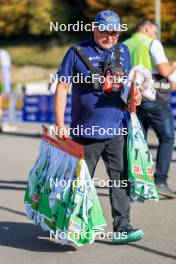 19.10.2024, Arcon, France (FRA): Event Feature: Volunteer carrying the race bibs - Biathlon Samse Summer Tour, sprint, Arcon (FRA). www.nordicfocus.com. © Manzoni/NordicFocus. Every downloaded picture is fee-liable.