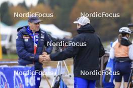 19.10.2024, Arcon, France (FRA): Patrick Favre (ITA), coach Team France, Lionel Laurent (FRA), media coordinator Team France, (l-r) - Biathlon Samse Summer Tour, sprint, Arcon (FRA). www.nordicfocus.com. © Manzoni/NordicFocus. Every downloaded picture is fee-liable.