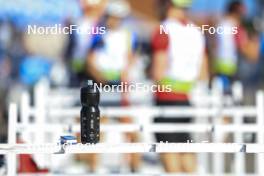 25.08.2024, Otepaeae, Estonia (EST): Event Feature: Water bottle - IBU Summer Biathlon World Championships, pursuit junior men, Otepaeae (EST). www.nordicfocus.com. © Manzoni/NordicFocus. Every downloaded picture is fee-liable.