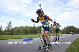 24.08.2024, Otepaeae, Estonia (EST): Vadim Kurales (KAZ), Tomas Kaukenas (LTU), (l-r) - IBU Summer Biathlon World Championships, sprint men, Otepaeae (EST). www.nordicfocus.com. © Manzoni/NordicFocus. Every downloaded picture is fee-liable.